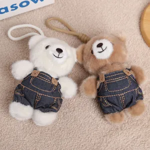 Portachiavi in peluche orsetto carino con salopetta di jeans, morbido ciondolo per borsa.