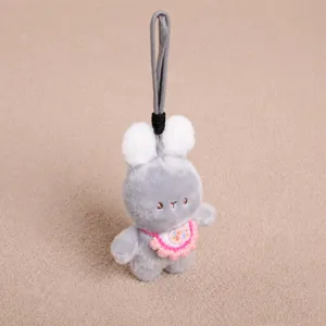 Porte-clés peluche lapin avec bavoir tricoté en détail, accessoire mignon pour sac à main.