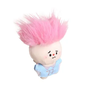Cute plush doll pendant with pink spiky hair and sad expression, soft toy bag accessory.