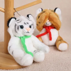 Simpatici giocattoli di peluche di tigre con sciarpe, morbide bambole di animali per bei regali.