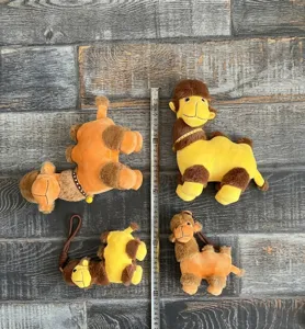 Cute plush camel doll pendant, soft stuffed animal toy for kids bags and keychains decor.
