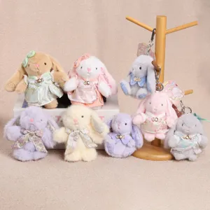 Detailed view of Chinese-style Wendy rabbit plush toy keychain with delicate outfits.