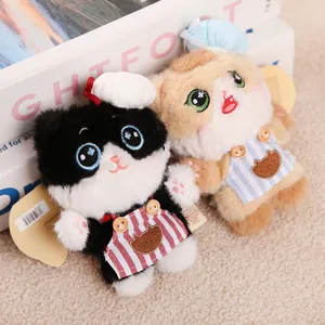 Detailed view of cute Rice Pudding Cat plush keychain, soft stuffed doll pendant for girls.