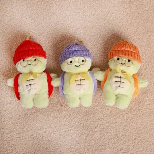 Mignon porte-clés en peluche tortue avec bonnet tricoté et lunettes, charme de sac.