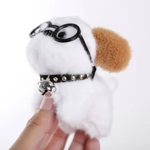 Schattige pluche puppy speelgoed hanger met bril en bel, perfect voor handtas decor.