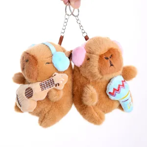 Mignon porte-clés en peluche capybara avec instruments, charm de sac animal en peluche doux