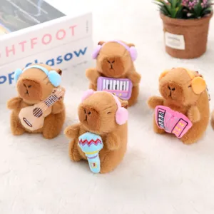 Mignonne peluche capybara avec instrument de musique, poupée en peluche douce pendentif cadeau.