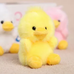 Cute yellow plush duck toy soft stuffed animal doll for kids gift decoration fluffy cute design.