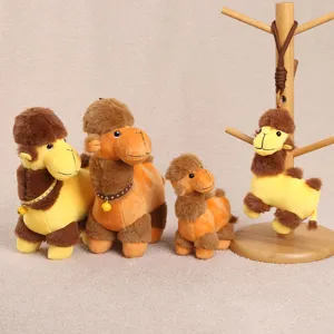 Plush camel doll hanging detail shot, soft fabric and cute design for bags or keys.