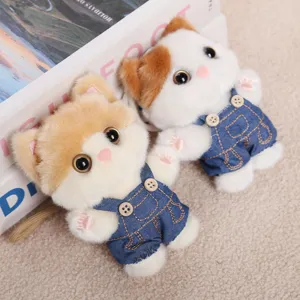 Cute plush cat keychain pendant stuffed animal toy with denim overalls, soft and lovely bag charm.