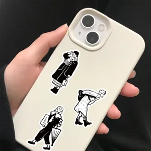 Primer plano detallado de pegatinas de personajes minimalistas en blanco y negro en funda.