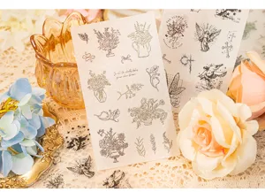 Vintage line art sticker sheets with floral and angel designs for DIY journaling crafts.