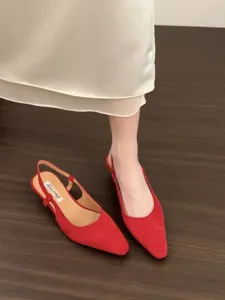 Red suede slingback pointed-toe low heel shoes detail view, elegant retro style for women.