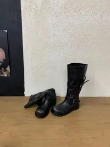 Bottes mi-mollet souples noires à brides bouclées, bottes cavalières rétro pour femmes.