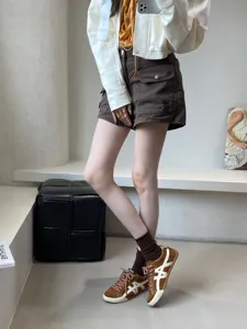 Women casual sneakers retro training shoes matching brown shorts jacket outfit stylish everyday wear