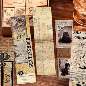 Vintage paper bookmarks and junk journal DIY materials with retro butterfly and newspaper designs.