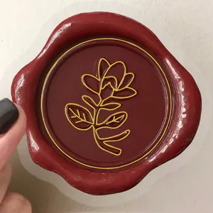 Detailed view of red gold vintage wax seal style PET decorative sticker for journal phone.