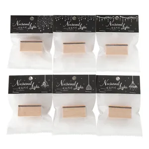 Houten stempelset met nachtelijke lichten, creatieve briefpapier en decorative knutselartikelen.