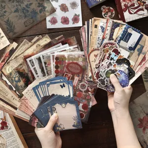 Vintage journaling material pack with various stickers and decorative notes for DIY crafts.