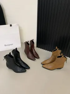 Chunky heel French vintage western ankle boots for women, stylish autumn footwear collection.