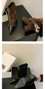 Detailed view of women fashion block heel short boots featuring chic chain and pointy toe design.