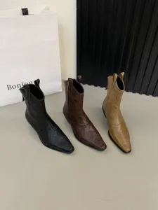 Women's French vintage chunky heel western cowboy short boots, stylish pointed toe design.