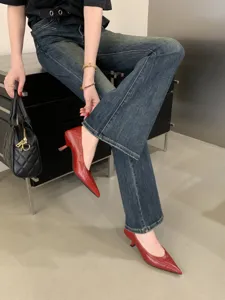 Elegant red pointed-toe kitten heel pumps for women, stylish commute footwear detail view.