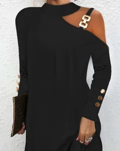 Elegant black long sleeve dress featuring a chic halter neck, metal chain strap, and button cuffs.