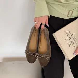 Velvet flat ballet shoes with sweet bow design, comfortable and elegant slip-on footwear.