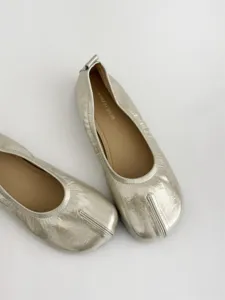 Silver split-toe ballet flats crafted from glossy soft leather, stylish and unique design.