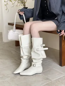 Stylish white knee-high boots with modern square toe and chic buckle strap details.
