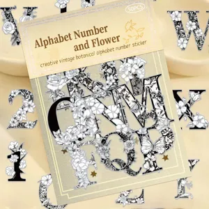 Close-up detail of vintage botanical alphabet and number transparent stickers for journal decor.