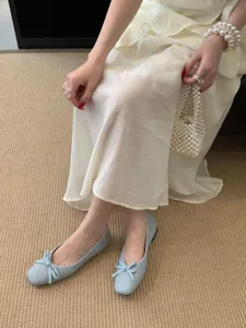 Square toe bow flat ballet shoes detail shot, elegant daily wear comfort footwear.