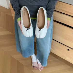 White split-toe tabi flat ballet shoes for women, comfortable slip-on low heel casual footwear.