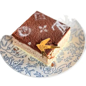 Topper per torta a forma di rondine in acrilico dorato per decorazione festa elegante.