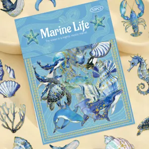 Close-up detail of 50pcs bronzing marine life stickers, transparent waterproof PET for DIY journaling.