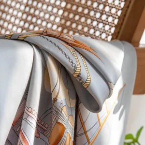 Luxurious silk scarf featuring elegant nautical print, premium drape for women accessory.
