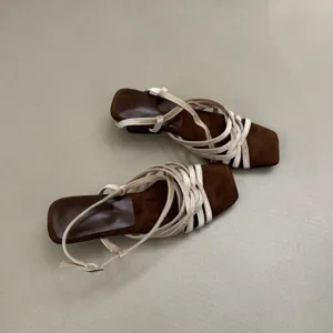 Square toe strappy heeled sandals detail, elegant velvet design for women.