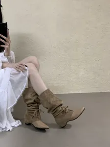 French pointed toe western cowboy boots mid-calf slouchy boots with suede splicing and chic bow design.