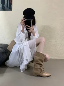 Women's French pointed toe Western slouchy mid-calf boots with hidden heel for casual chic style.