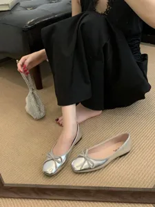 Silver square toe flat ballet shoes for women with cute bow, comfortable everyday wear.