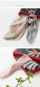 Elegant mulberry silk scarf in a luxury gift box, perfect women's fashion accessory gift.