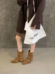 Bottes cavalières mi-mollet en suédine marron pour femmes, bottines western rétro à talons épais.