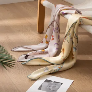 Mulberry silk square scarf detail, elegant floral butterfly print, soft luxury neckerchief.