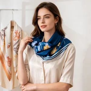 Elegant blue floral silk square scarf worn by model, premium neck scarf for women.