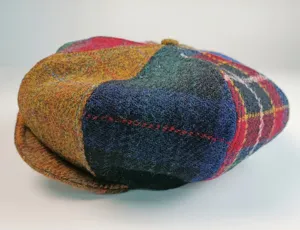 Detailed view of women's autumn winter wool patchwork tweed flat cap british style.