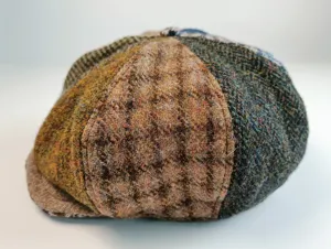 Detailed view of the vintage wool tweed patchwork newsboy flat cap, stylish autumn winter hat.