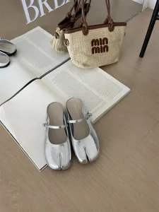 Silver split-toe Mary Jane mules for women, stylish metallic flat comfortable slip-on shoes.