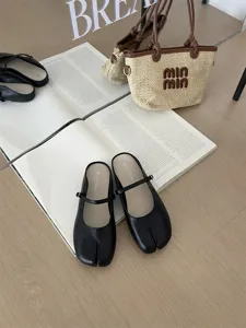 Black split-toe Mary Jane mule shoes for women, comfortable slip-on design, casual outdoor wear.