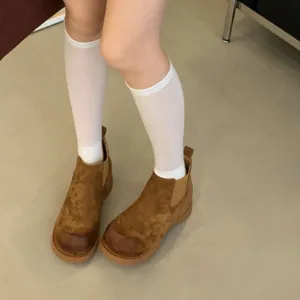 Retro chunky chelsea boots for women, brown suede round toe platform booties, stylish footwear.